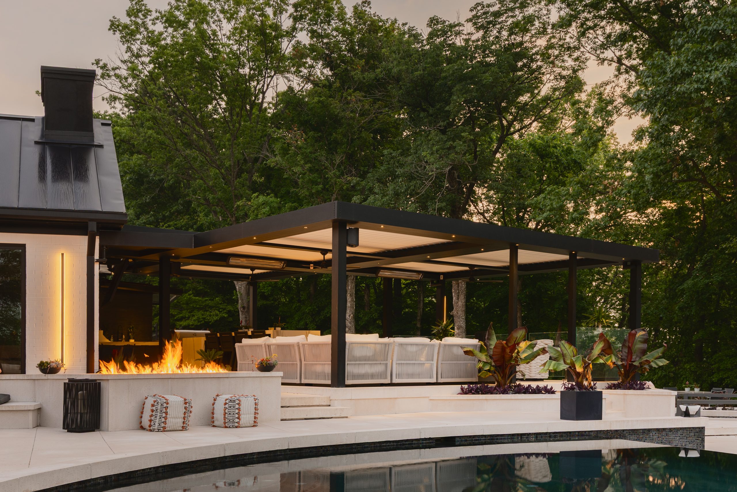 outdoor kitchen area louvered outdoor under pergola